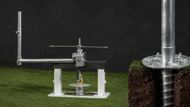 Studio technical illustration of a pull-test frame positioned over a helical ground screw.